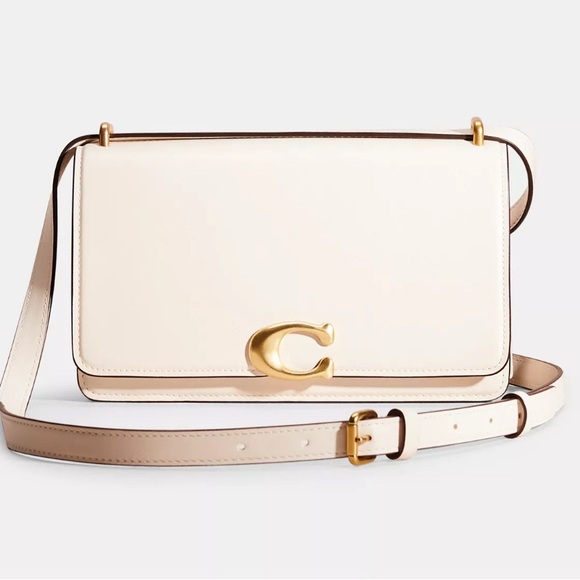 Coach Handbags - Coach Cream Shoulder Bag with Gold Accents
